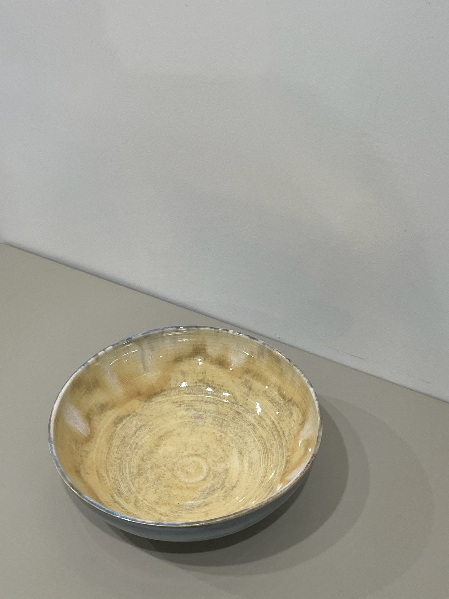 Marissa / Dark blue bowl with yellow interior