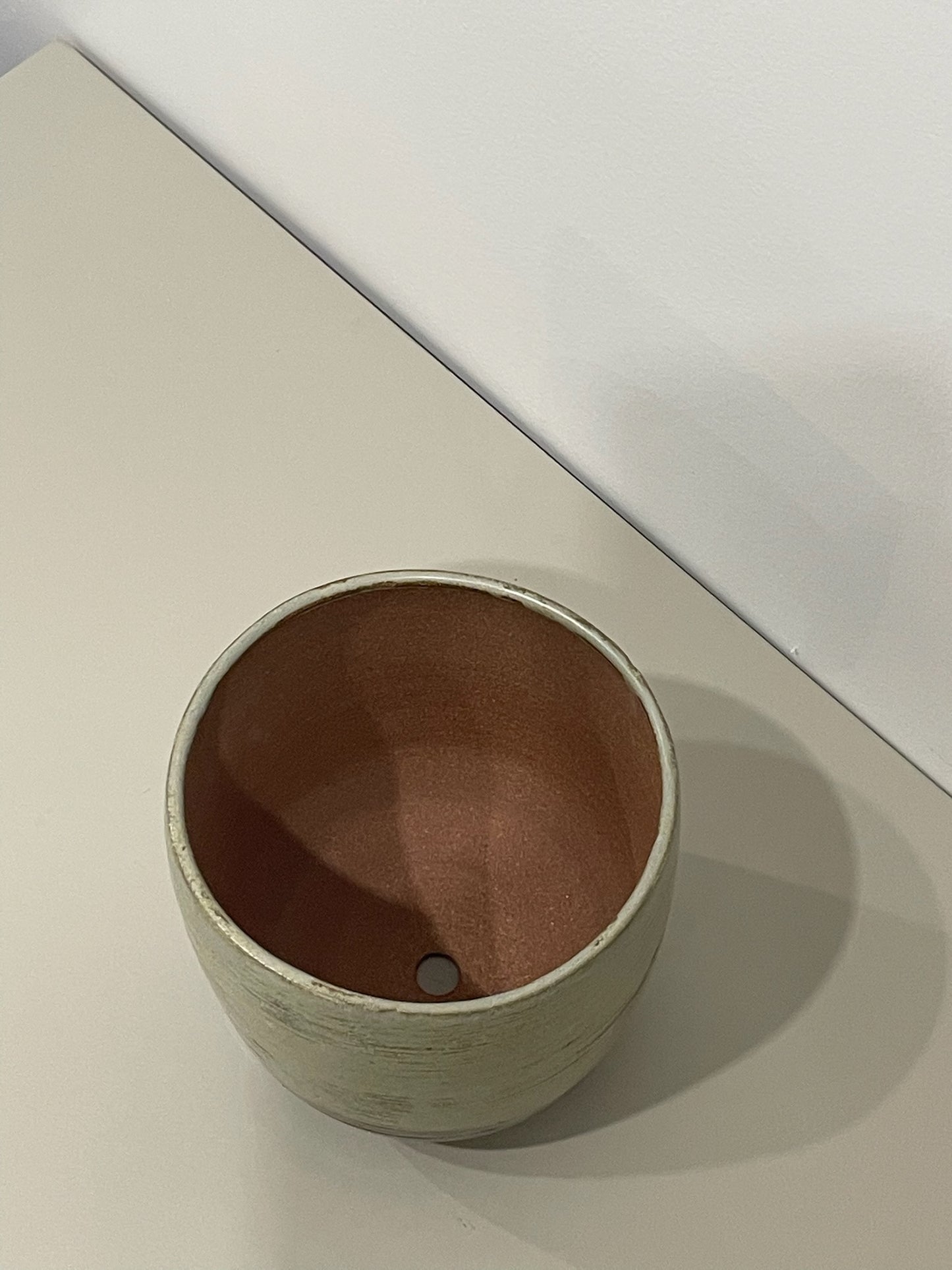 Marissa / Glazed pot on red clay