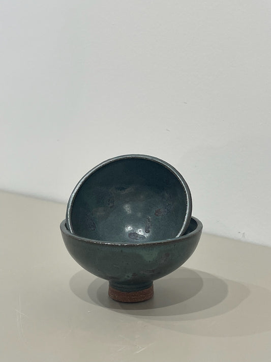 Marissa / Small dark turquoise sauce bowls on red clay